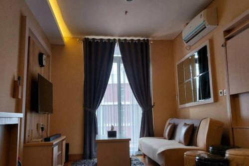Ragunan Apartment | Apt Pejaten Park 1BR Brown By Damaresa