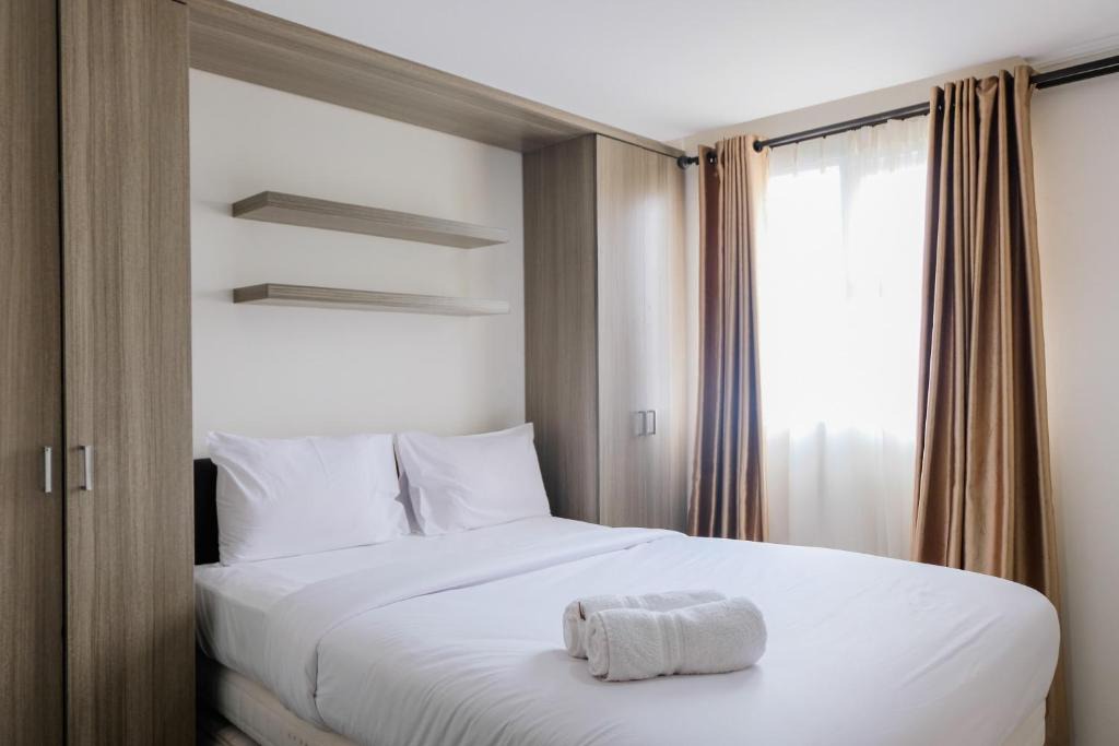 Ciputat Apartment | Comfy and Tranquil Studio Room Bintaro Icon Apartment By Travelio