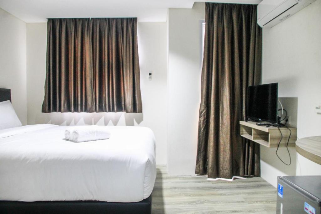 Ciputat Apartment | Comfy Studio Room Bintaro Icon Apartment By Travelio