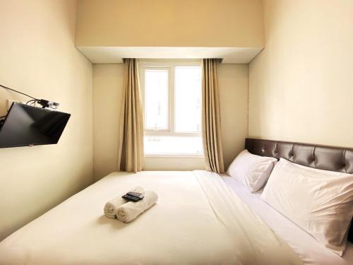 Hegarmanah Apartment | Fancy and Nice 2BR Apartment at Skyland City Jatinangor By Travelio