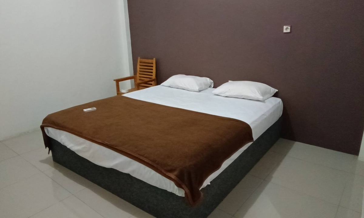 Banjarmasin Hotel | Hotel O Fanilly Guest House MarabahanNearJembatan Rumpiang