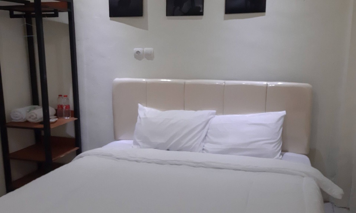 Sei Pinang Hotel | Hotel O Wisma Flamboyan NearTaman Makam Pahlawan