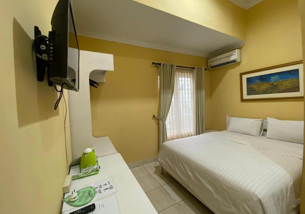 Sleman Hotel | Omah Inap D24 Syariah near Universitas Aisyiah Yogyakarta Mitra RedDoorz