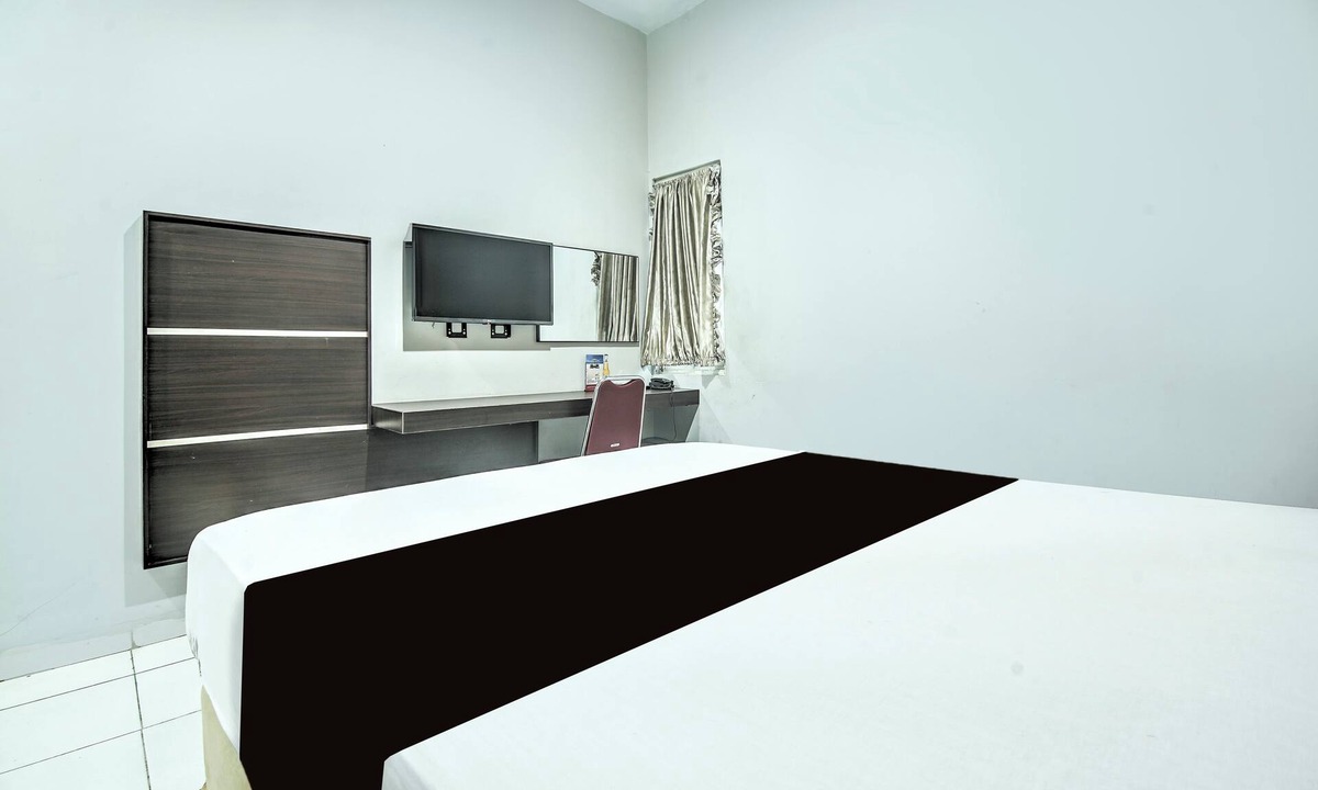 Panakkukang Hotel | OYO 94781 Hotel Lucky Inn Makassar