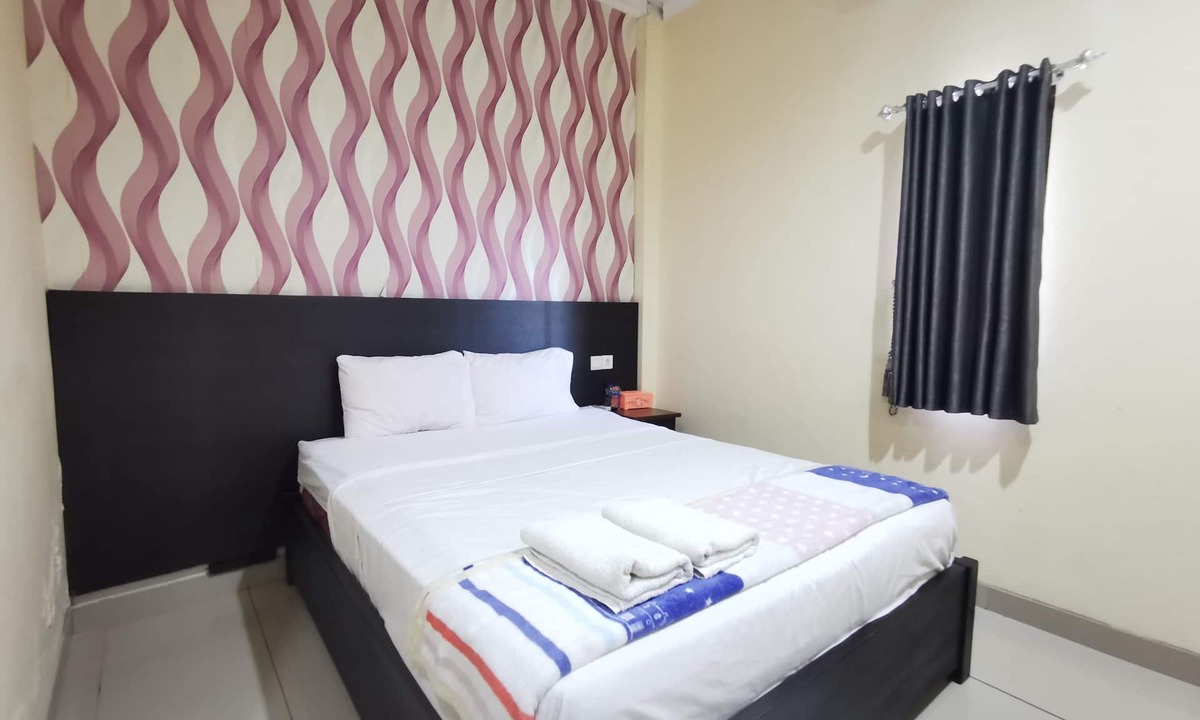 Sangatta Utara Hotel | OYO 95059 Ikon Guesthouse