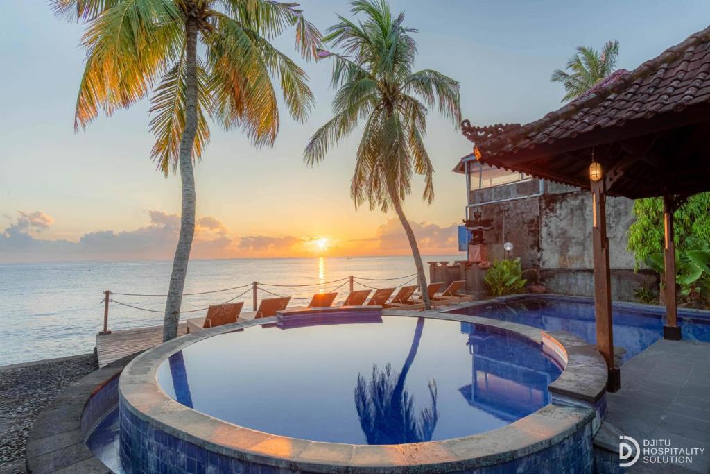 Tulamben Resort | Paradise Palm Beach Bungalows and Dive Center