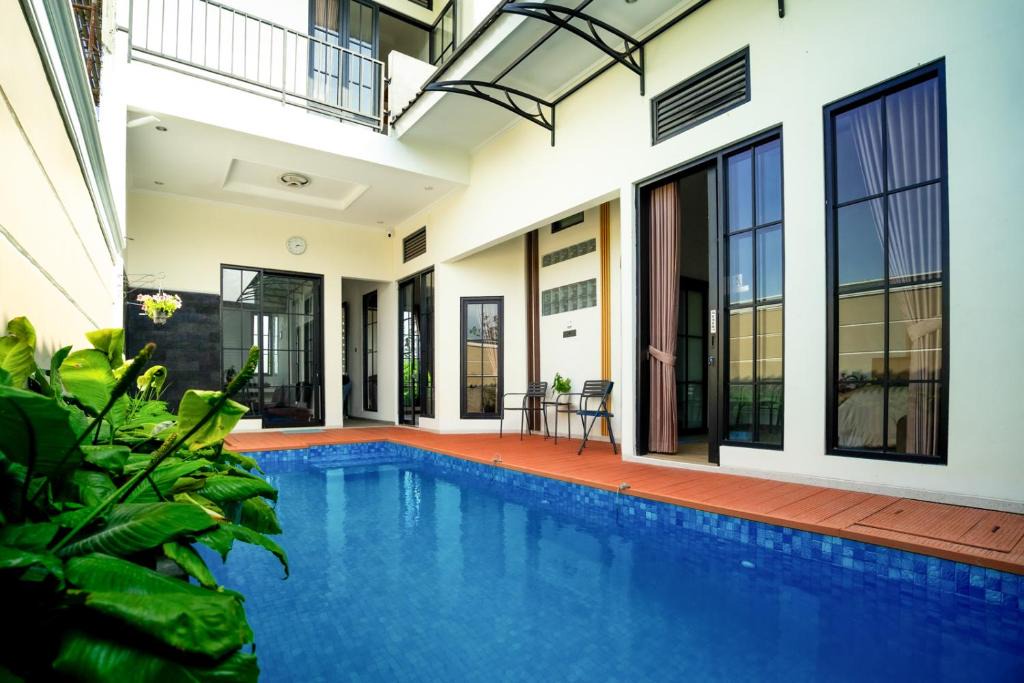 Sidomulyo Villa | TwoSpaces Living at Carrera Villa, Batu