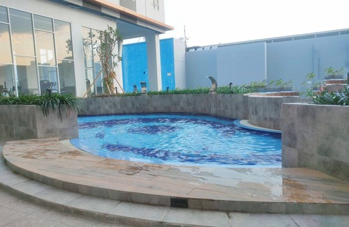 Sidoarjo Apartment | Bright Woody Vibes Studio Room At Suncity Residence Apartment