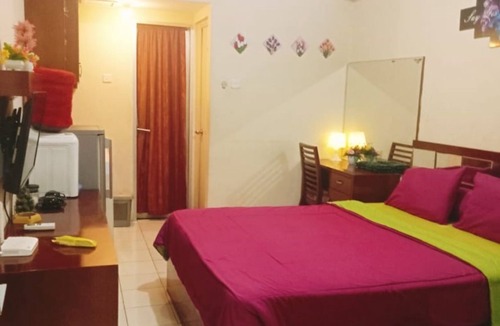 Pondokcina Hotel | Capital O 93937 Aditya Rooms