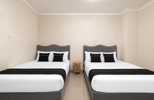 East Jakarta Hotel | Collection O near Stasiun Cawang formerly Griya Harita Syariah