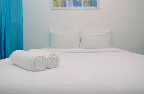 Jatinegara Apartment | Cozy Living Studio Apartment at Bassura City By Travelio