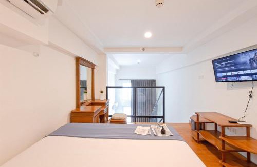 Tangerang Apartment | Cozy Stay and Comfy Studio Loft Kingland Avenue Apartment By Travelio