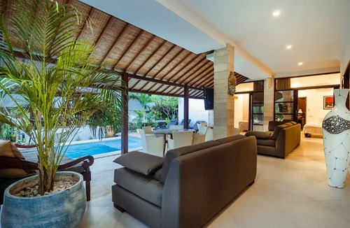 Petitenget Villa | Experience Mawar Estate, a 7-bedroom private villa estate in Seminyak. Accommodates up to 14 guest, includes daily breakfast, a full-time private chef, airport transfers, complimentary massages, housekeeping, and a dedicated driver.