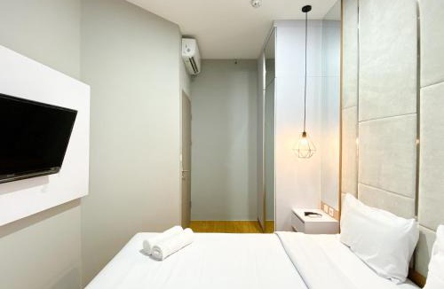 Cikarang Apartment | Homey and Minimalist 1BR Vasanta Innopark Apartment By Travelio