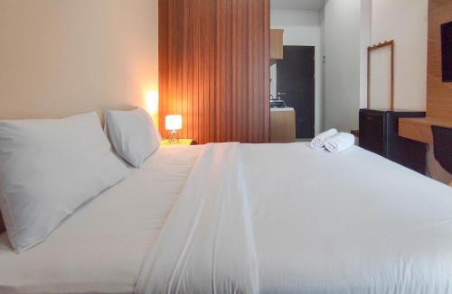 Sidoarjo Apartment | Homey Studio with Easy Pool Access Apartment at Suncity Residence By Travelio
