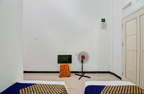 Pekanbaru Hotel | Hotel O Penginapan Puti SyariahNearBandara Sultan Syarif Kasim II
