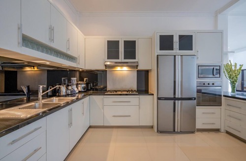 Dyanapura Villa | Luxury 10-bedroom private villa estate located in Seminyak, offering daily breakfast, a full-time private chef, airport transfers, complimentary massages, housekeeping, and a dedicated driver.