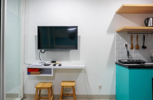 Pondokcina Apartment | Modern 1BR Apartment at Atlanta Residence By Travelio
