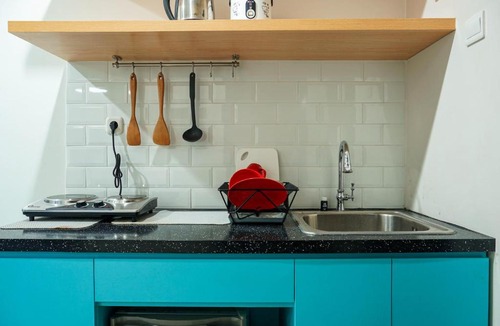 Pondokcina Apartment | Modern 1BR Apartment at Atlanta Residence By Travelio