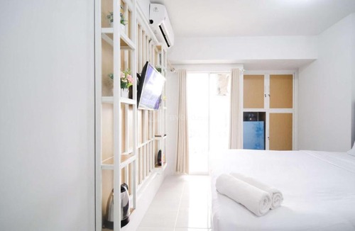 Sidoarjo Apartment | New Studio Apartment with Strategic Location at Suncity Residence By Travelio