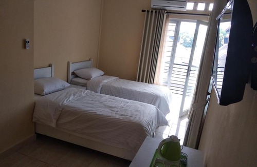 Sleman Hotel | Omah Inap D24 Syariah near Universitas Aisyiah Yogyakarta Mitra RedDoorz