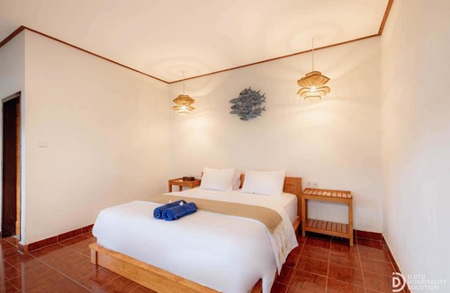 Tulamben Resort | Paradise Palm Beach Bungalows and Dive Center