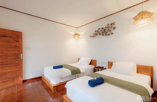 Tulamben Resort | Paradise Palm Beach Bungalows and Dive Center