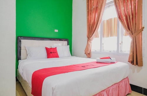 Gunung Sugih Hotel | RedDoorz Syariah near Kebun Raya Liwa