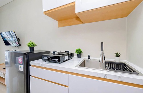 Kedungmanggu Apartment | Restful Studio With City View At Royal Sentul Park Apartment
