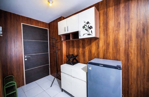 Sidoarjo Apartment | Wood Accents Studio At Tamansari Prospero Sidoarjo Apartment