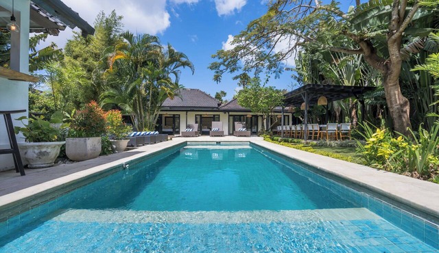 10-bedroom private estate in Seminyak, perfect for large groups, family gatherings, retreats, and celebrations. Enjoy daily breakfast, a private chef, airport transfers, complimentary massages, housekeeping, and a dedicated driver.
