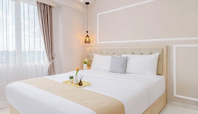 2BR Corner with South and East View at Podomoro Golf View Apartment