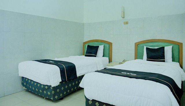 Cozy Twin Escape with Free WiFi and Parking in Palembang