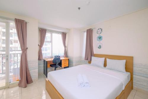 Fully Furnished and Comfy Studio Apartment Margonda Residence 3 By Travelio in Depok