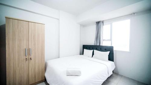 Homey 2BR Apartment at Suncity Residence By Travelio in Sidoarjo