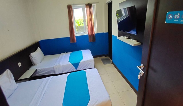 Hotel O Nilam Guest HouseNearYani Heahlerr in Marabahan