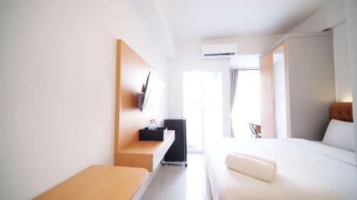 Tidy and Cozy Stay Studio Apartment at Suncity Residence By Travelio in Sidoarjo