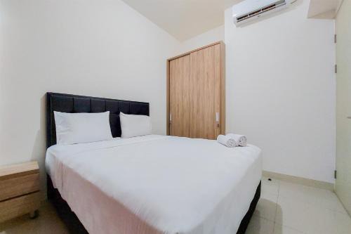 Warm and Enjoy Living 1BR Tree Park City BSD Apartment By Travelio