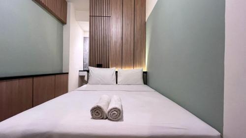 Warm and Homey 2BR at Vida View Makassar Apartment By Travelio in Makassar