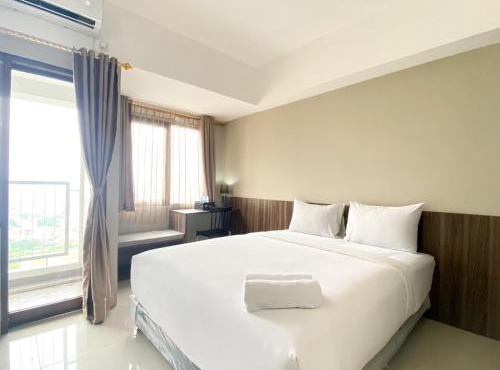 Well Furnished and Cozy Studio at Gateway Park LRT City Jatibening Apartment By Travelio in Jakarta