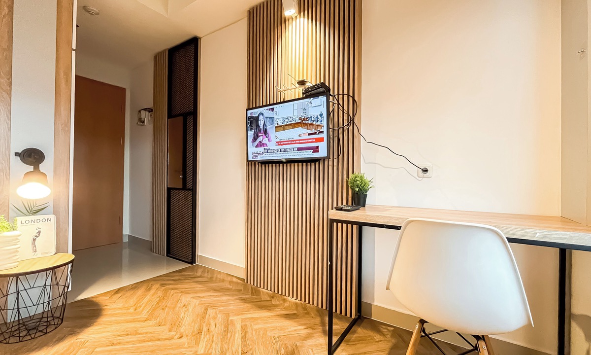 Pondokcina Apartment | Wooden Nest 2Br Without Living Room At Evenciio Margonda Apartment