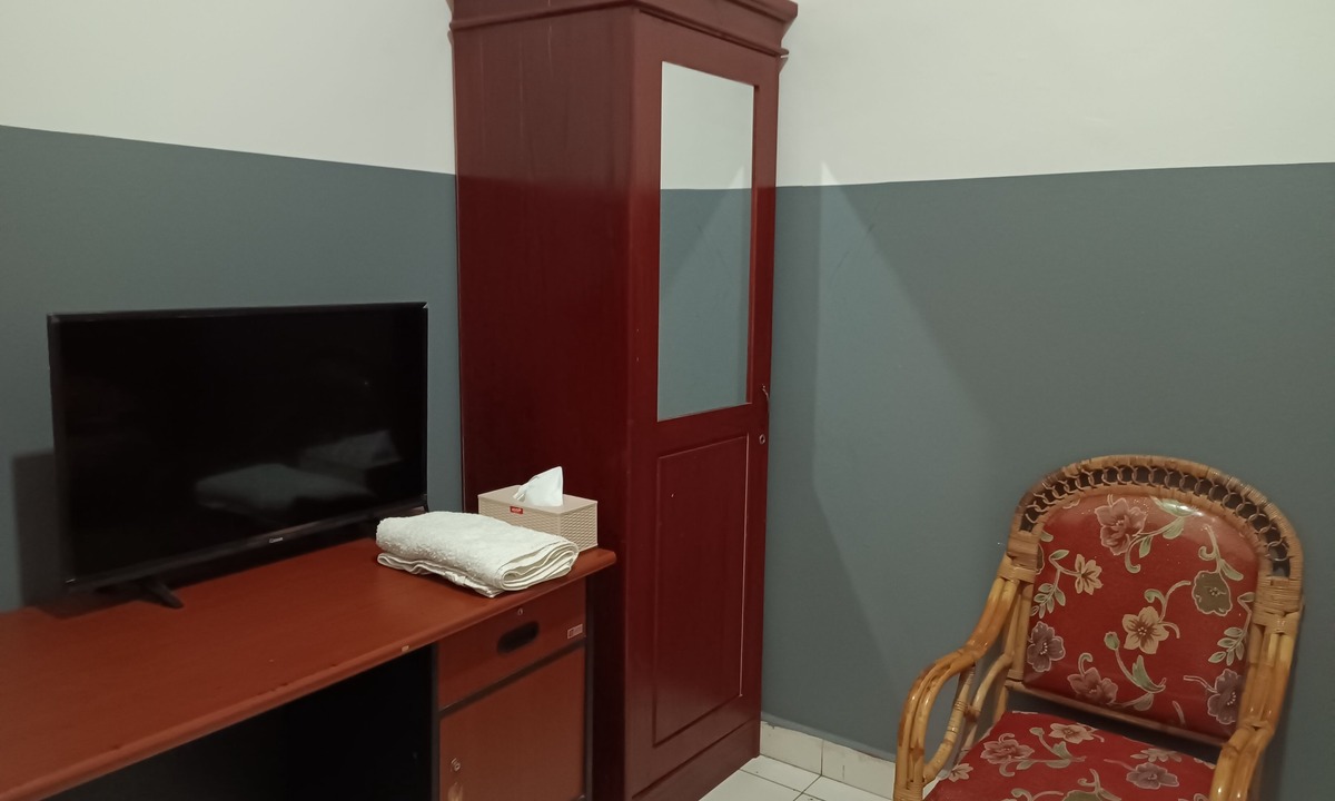 Waena Hotel | OYO 93117 Penginapan Tiga Dara