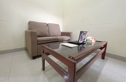 Melayu Hotel | Hotel O Losmen Arkansas Syariah