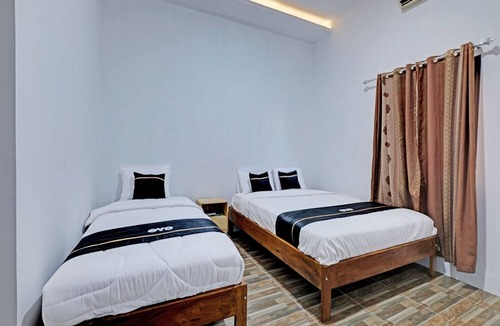 Sleman Hotel | Capital O 92963 Global House Syariah