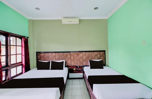 Cokroaminto Hotel | Collection O Bali near Terminal Ubung formerly Batukaru Garden Hotel