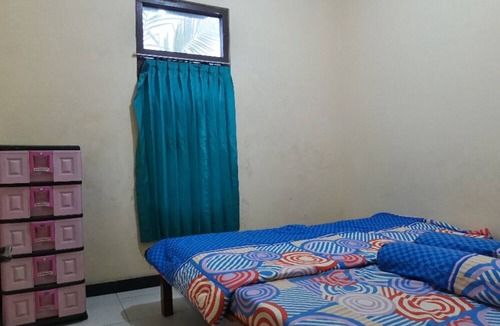 Banjarasri Hotel | OYO Homes 91083 Desa Wisata Plosokuning Syariah