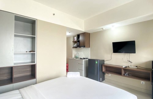 Duren Sawit Apartment | Well Furnished and Cozy Studio at LRT City Jatibening Apartment