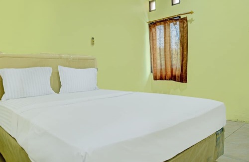 South Ogan Komering Ulu Hotel | Capital O 92316 Wisma Widya Loka Pratama Near Futsal Tebing Gading