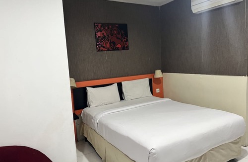 Mendawai Hotel | Hotel O Tri Homestay