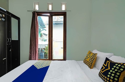 Muncar Hotel | OYO Life 92258 Kostel 21 Syariah